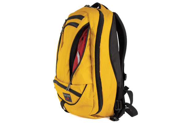 The Synik 22 in Sunglow (mustard yellow) X-Pac® with a Sangria (red with dark red grid) 200 Halcyon interior.